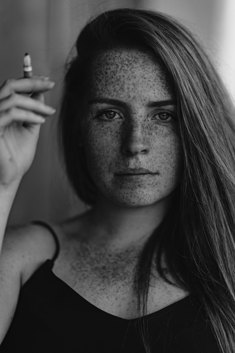 Portrait einer Frau mit Sommersprossen
